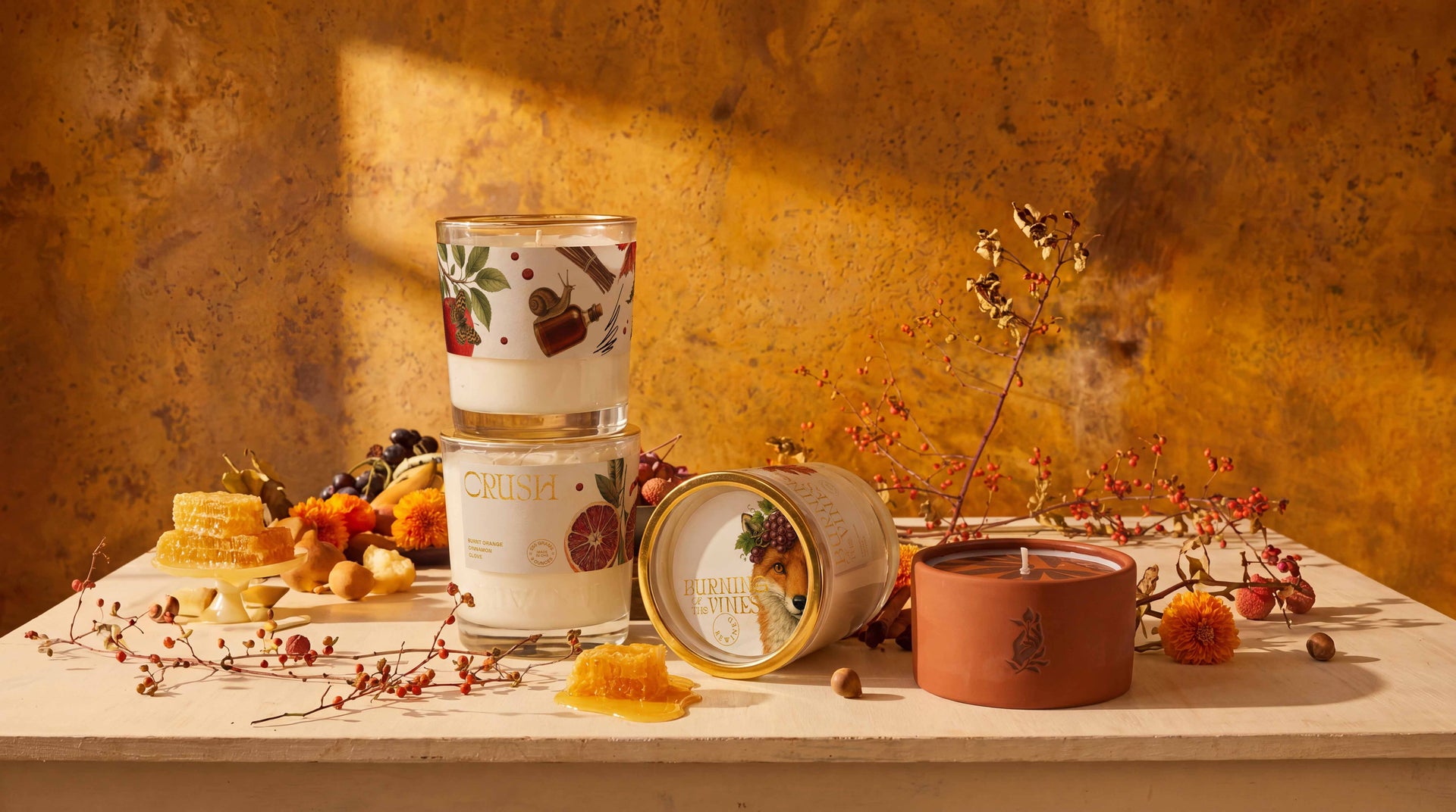 Harvest collection candles in autumn light