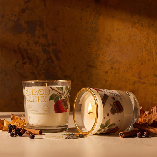 Rewined Harvest Spiked Cider candle, 10 oz, lit