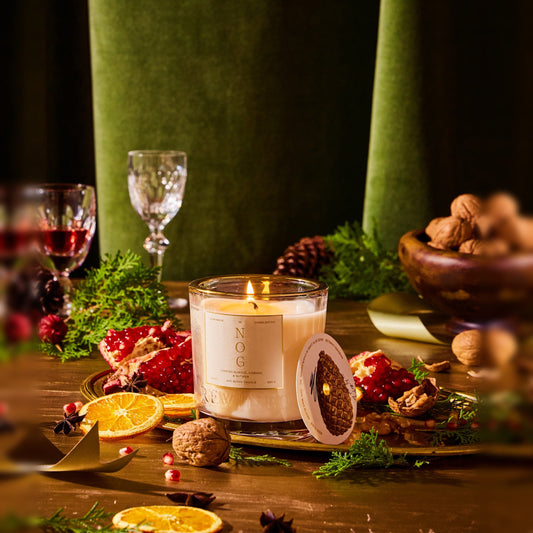 Rewined Nog holiday candle, lit