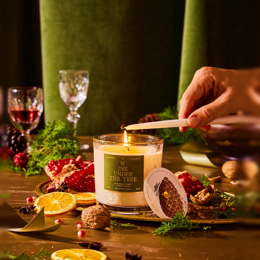 Rewined Wine Under The Tree holiday candle, lit