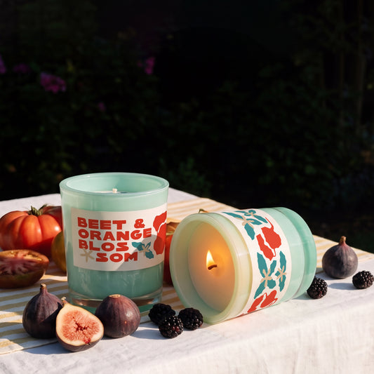 Rewined Market Beet & Orange 10 oz candle, lit