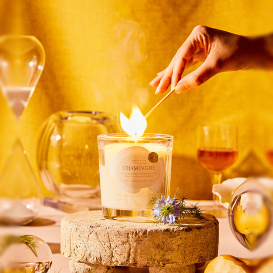 Rewined Sparkling Champagne candle, 10 oz, lit