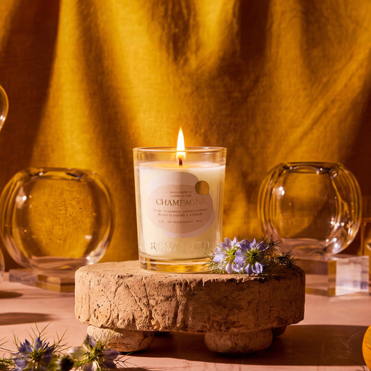 Rewined Sparkling Champagne candle, 6 oz, lit